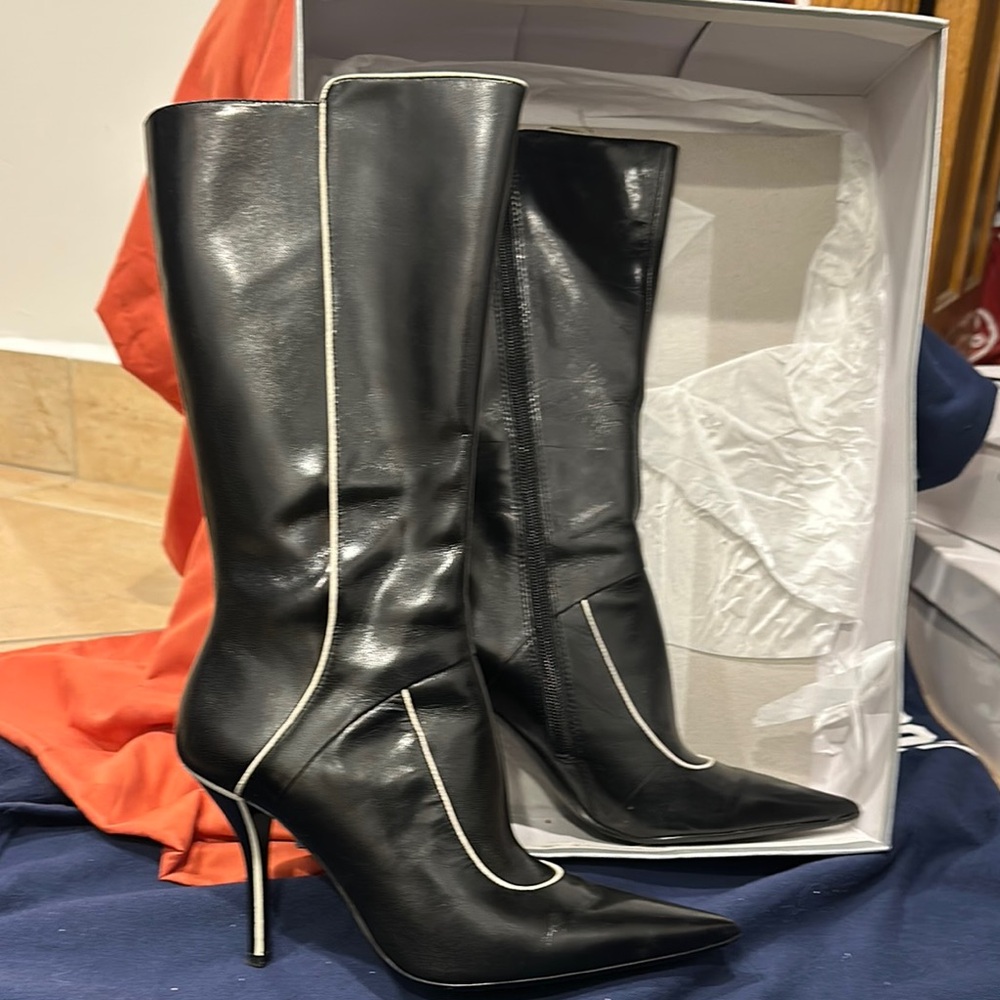 Heeled boots/ black kck and white/like new